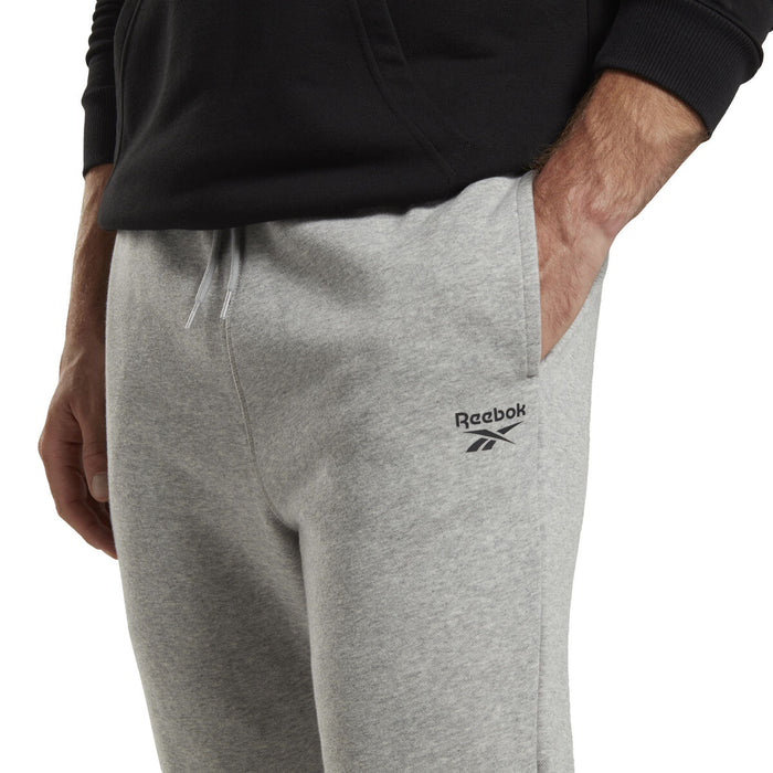 Pantaloni pentru Adulți Reebok FT LEFT LEG JOGG HZ8785  Gri Bărbați