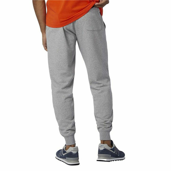 Pantalon de Trening pentru Adulți Essentials Stacked Logo New Balance MP03558 Bărbați