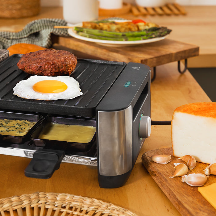 Raclette cu grill Cecotec Cheese&Grill 16000 Inox Black, 1400 W, pentru 8 persoane, suprafață 40 × 22 cm