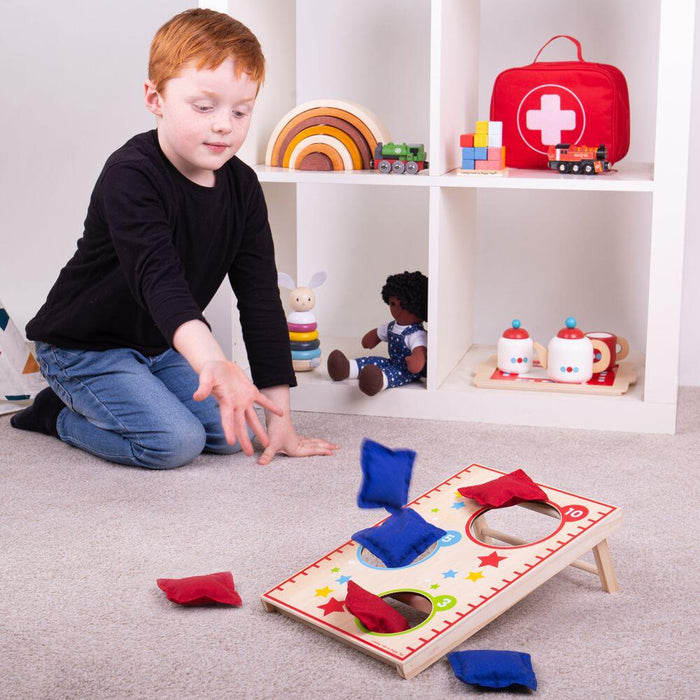Joc de îndemânare, Bigjigs Toys, saculeti colorați, lemn