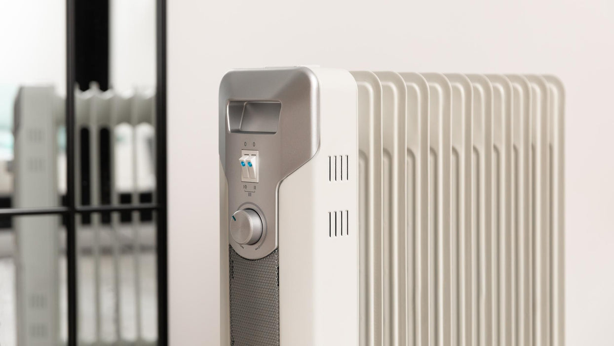Radiator cu ulei Cecotec ReadyWarm 11000 Space, 2500 W, 11 elementi, 25 m², alb
